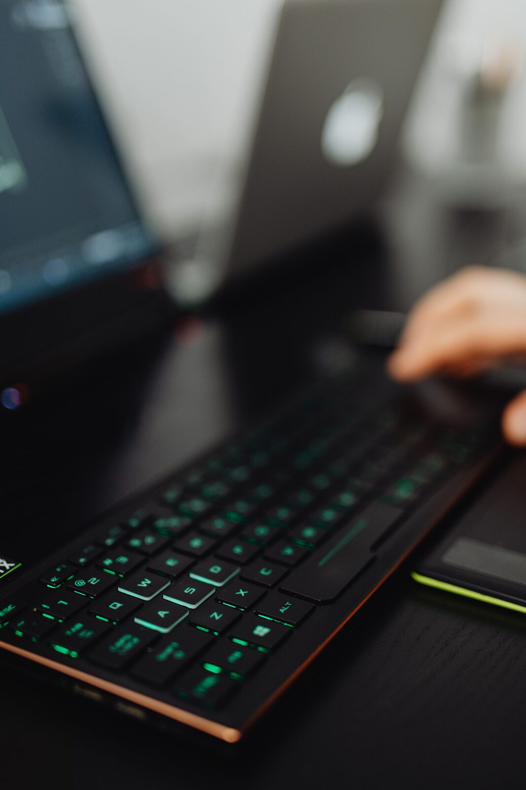 Close-up of a backlit laptop keyboard