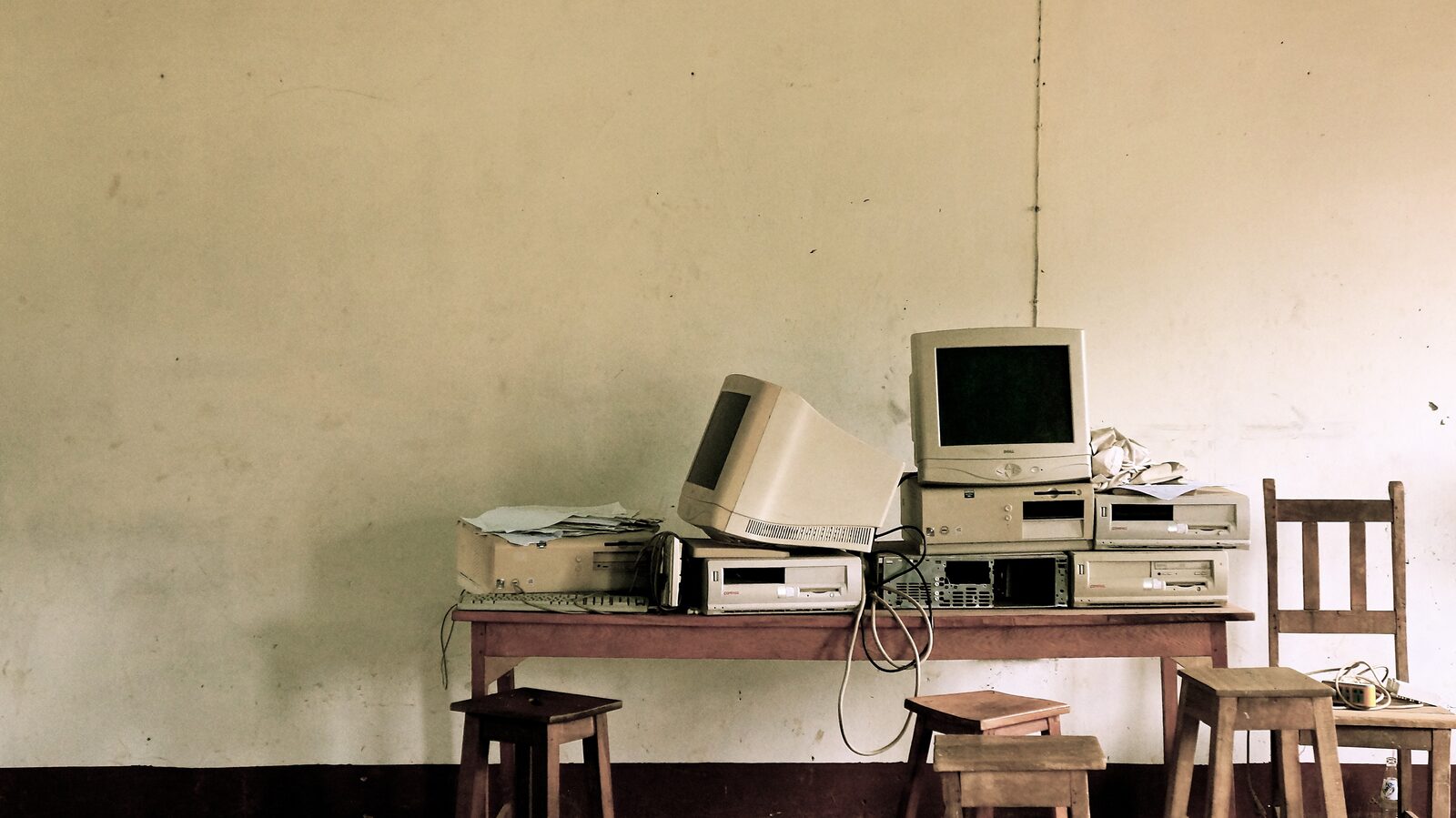 An old desktop computer left on a desk
